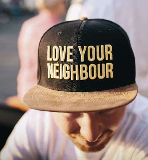 love your neighbor cap